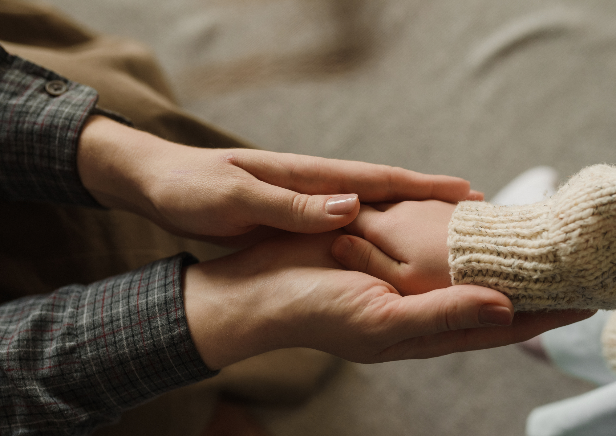 Two people holding hands